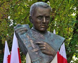 Grafika: Kraków: franciszkanin przy pomniku jezuity